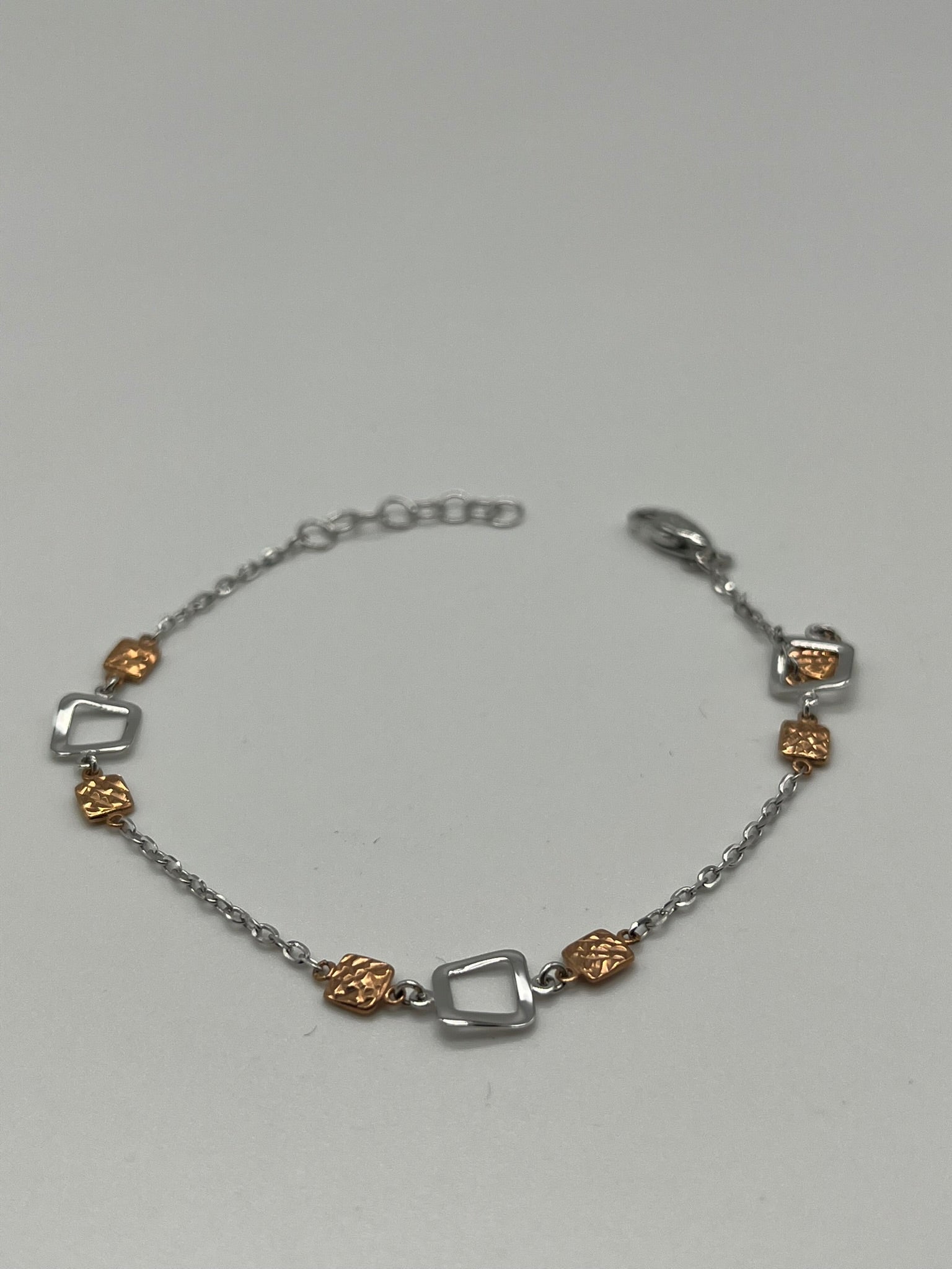 Bracciale in oro bianco 18kt con dettagli in oro rosa